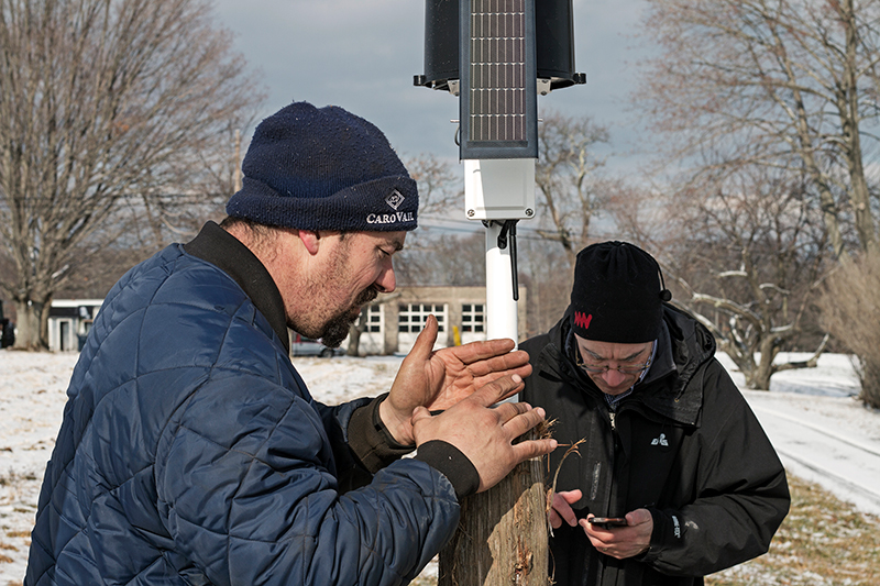 David Hollinger and William Della Camara set up the weather station at Cecarelli Farms in January 2017