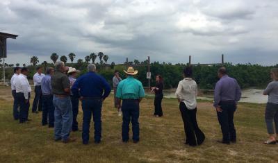 A site visit by participants in a workshop on experimental agriculture in Weslaco, Texas, in 2017.