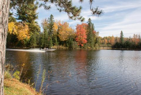 Boat on forested lake on Chequamegon-Nicolet NF