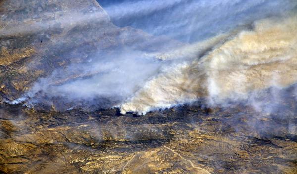 From a Dec. 8, 2017, International Space Station flyover of Southern California, NASA astronaut Randy Bresnik photographed the plumes of smoke rising from wildfires