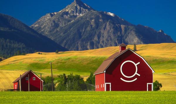 A picture of a red barn in front of a mountain in Oregon. Credit: U.S. Forest Service